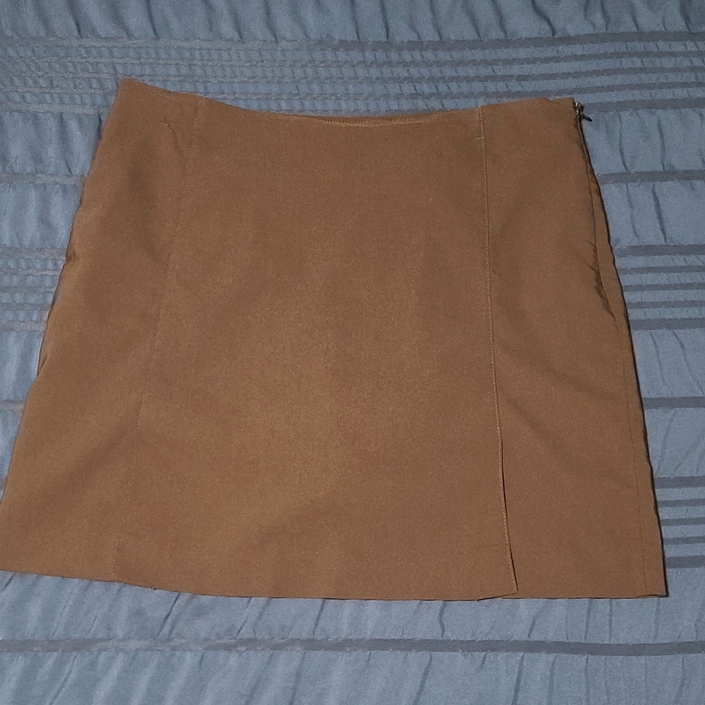 2 golf skirts .  Size 10/med